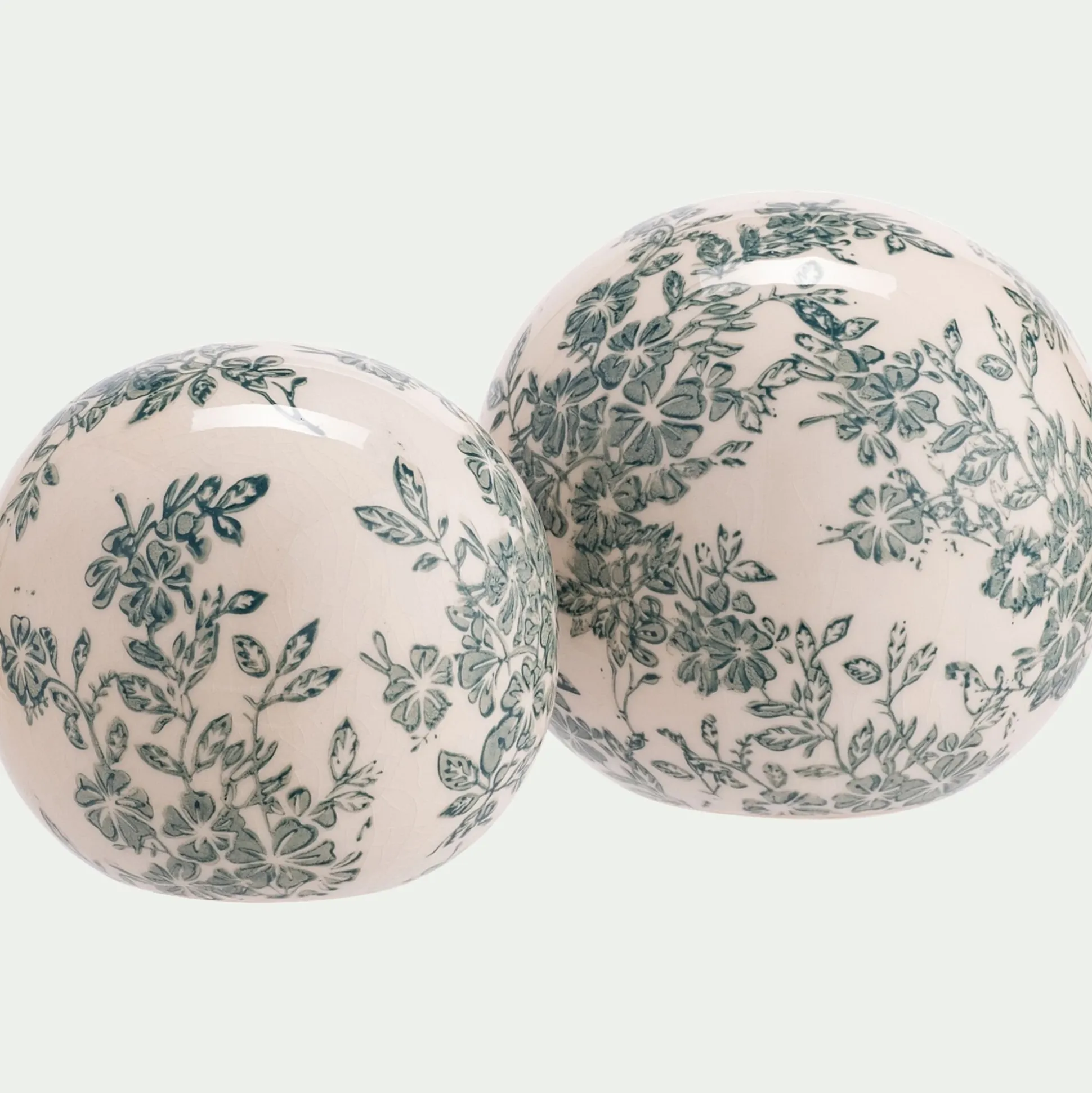 Boule de noel motif fleuri en céramique D11,8cm - blanc