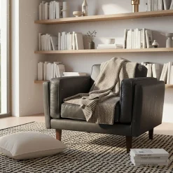 Fauteuil en cuir de vachette noir