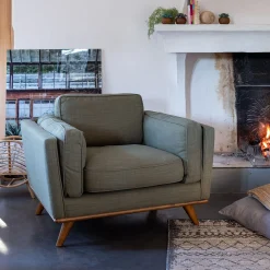 Fauteuil en tissu kaki cèdre