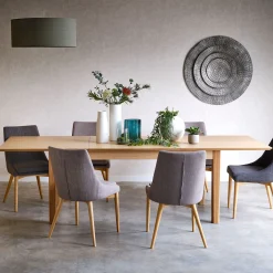 Table de repas extensible en bois - bois clair (8 à 12 places)